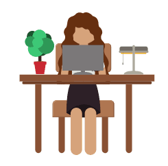Girl at desk on laptop next to lamp.