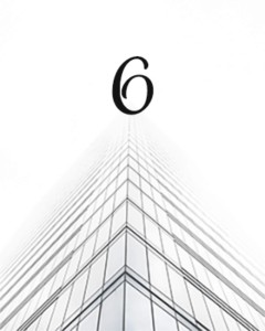 Figure number 6 above a highrise building.